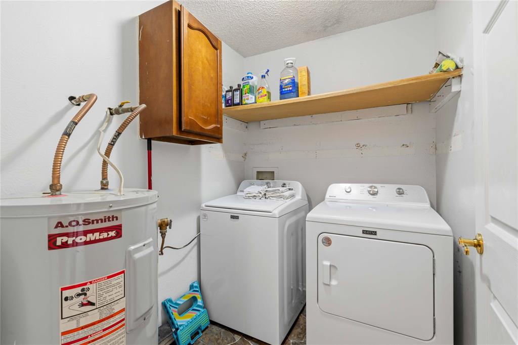 100 County Road 319 Early, TX 76802 - Photo 20 of 39 a utility room with dryer and washer