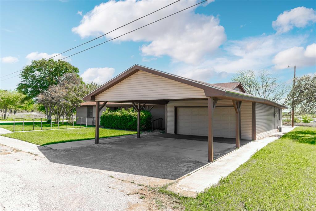 100 County Road 319 Early, TX 76802 - Photo 21 of 39 a view of a house with a yard