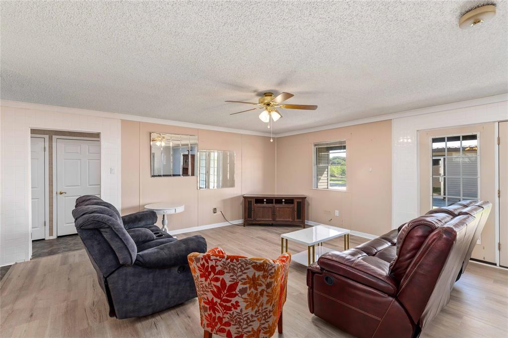 100 County Road 319 Early, TX 76802 - Photo 4 of 39 a living room with furniture and a couch