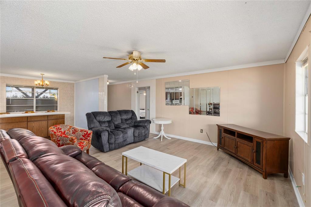 100 County Road 319 Early, TX 76802 - Photo 5 of 39 a living room with furniture and wooden floor