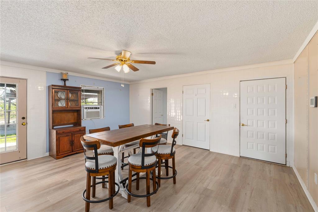 100 County Road 319 Early, TX 76802 - Photo 8 of 39 a dining room with furniture and window