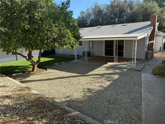 a view of backyard with green space