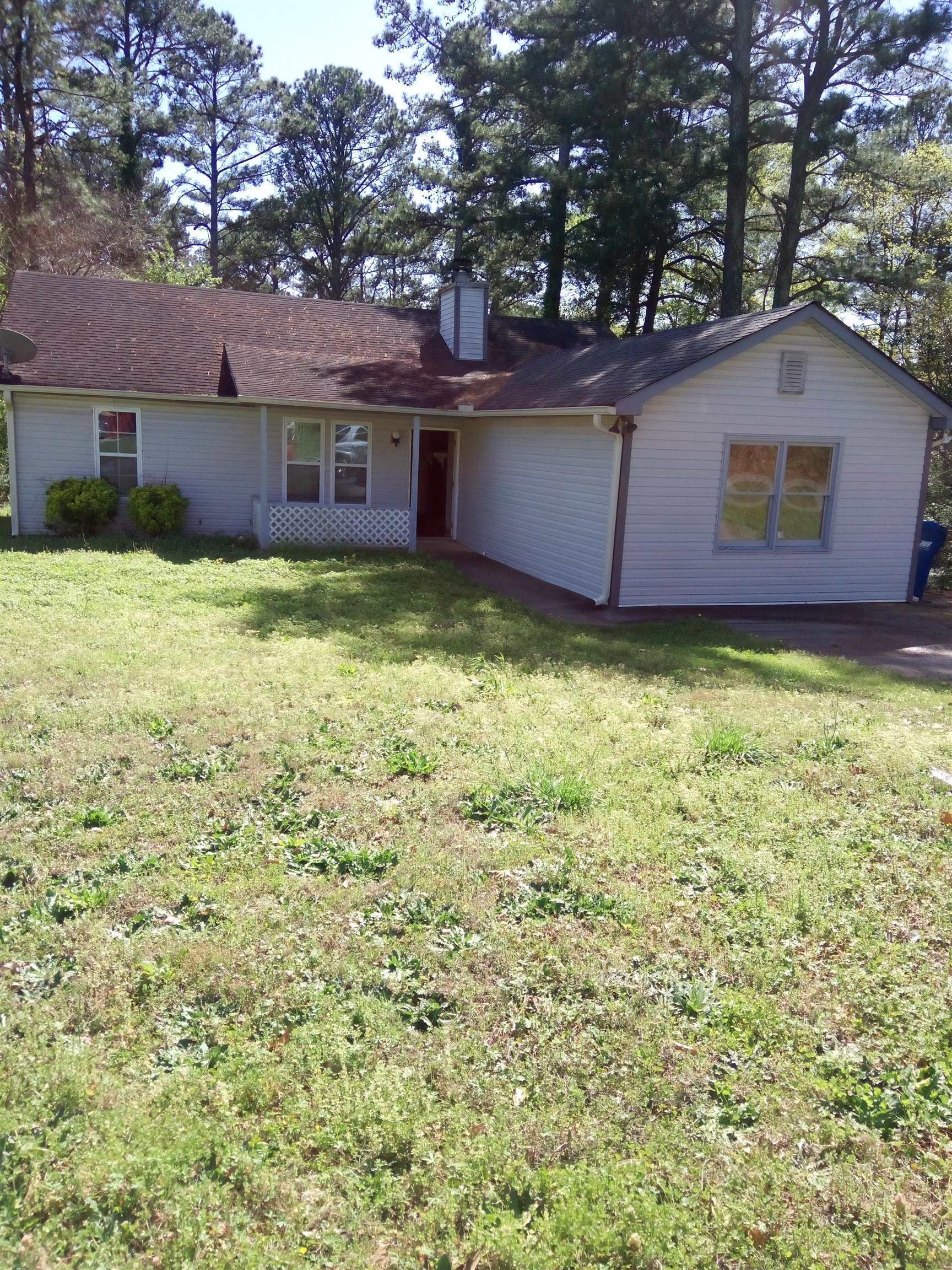 5392 Kirk Drive Atlanta, GA 30349 - Photo 1 of 1 a view of a house with a yard