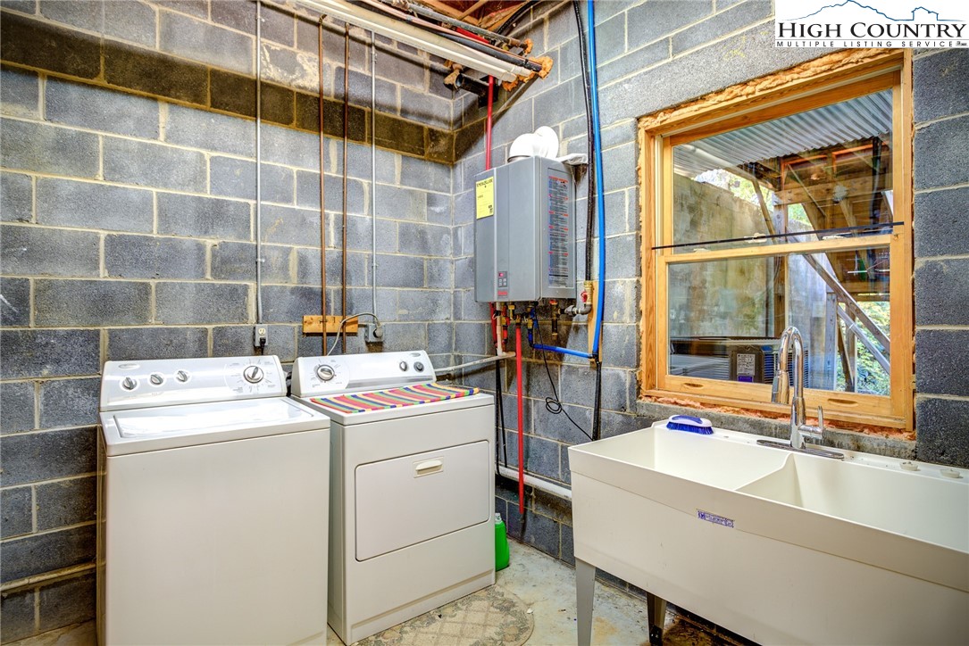 1267 Hopewell Church Road Boone, NC 28607 - Photo 39 of 50 a utility room with dryer and washer