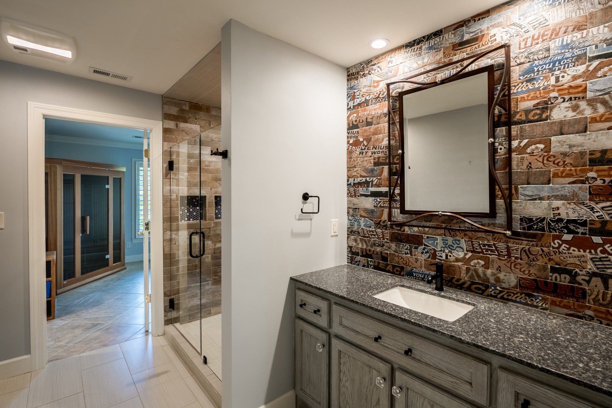 100 Point Circle Tullahoma, TN 37388 - Photo 16 of 33 a bathroom with a granite countertop sink and a mirror