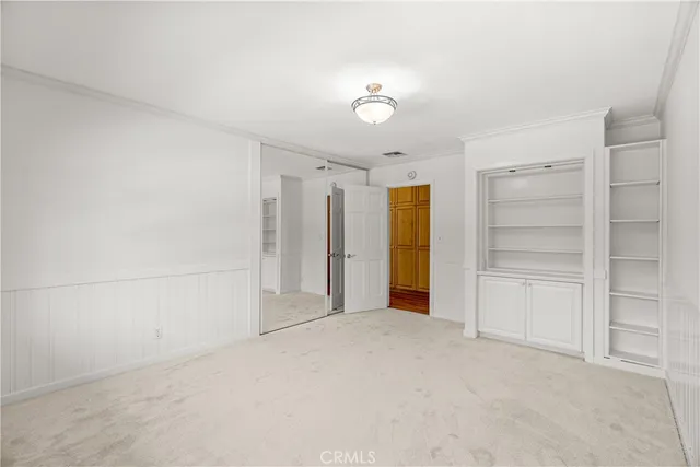 a bathroom with a sink a vanity and a mirror
