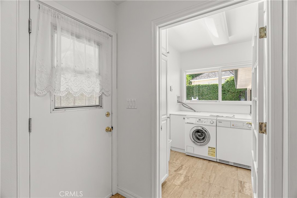 591 Busch Place Pasadena, CA 91105 - Photo 23 of 64 a utility room with dryer and washer