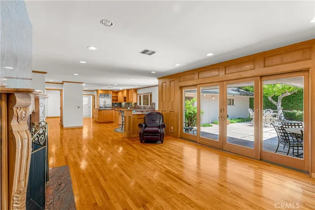 a bathroom with a granite countertop sink mirror and