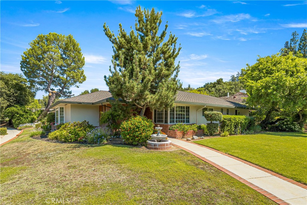 591 Busch Place Pasadena, CA 91105 - Photo 4 of 64 a front view of house with yard and green space