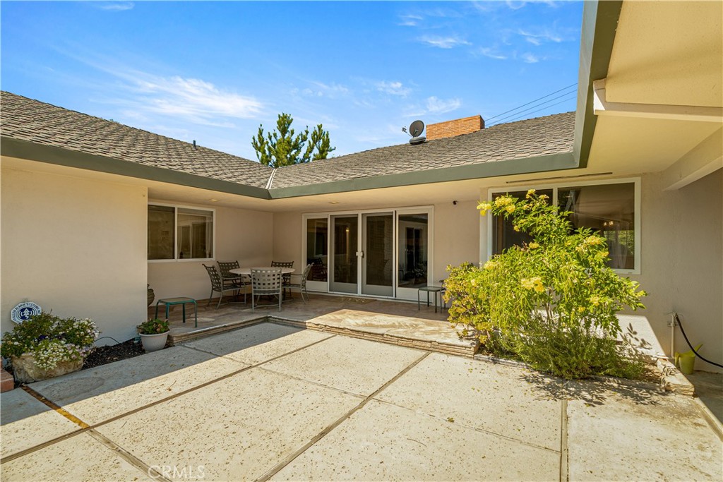 591 Busch Place Pasadena, CA 91105 - Photo 51 of 64 a house with garden in front of it