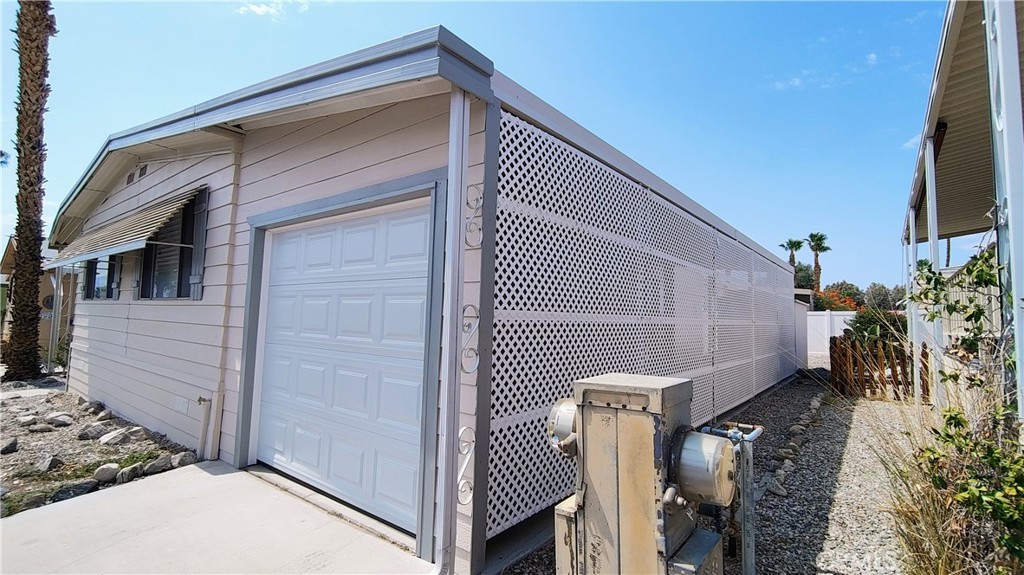 17640 Corkill Road, Unit 78 Desert Hot Springs, CA 92241 - Photo 41 of 58 Partially enclosed garage