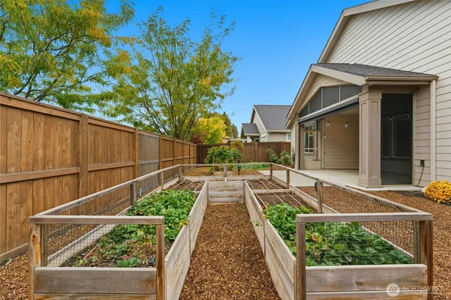 a front view of a house with a outdoor seating