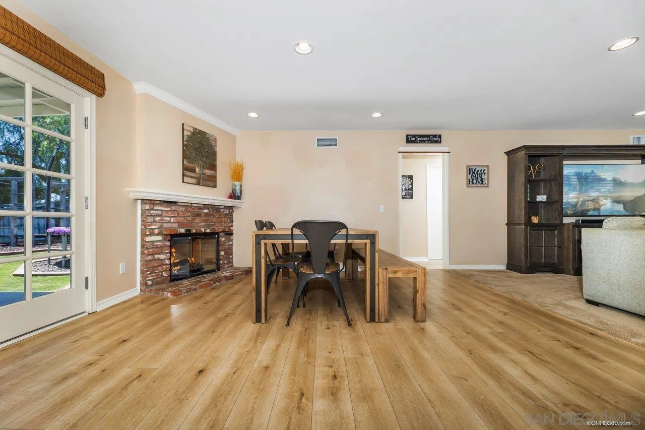 13317 Arikara Drive Poway, CA 92064 - Photo 13 of 52 a view of a livingroom with furniture and a kitchen