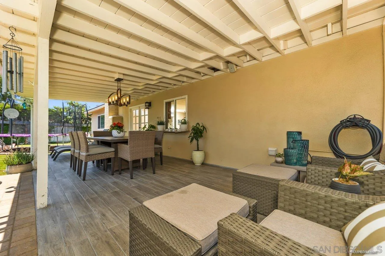 13317 Arikara Drive Poway, CA 92064 - Photo 29 of 52 a view of a dining room with furniture and chandelier