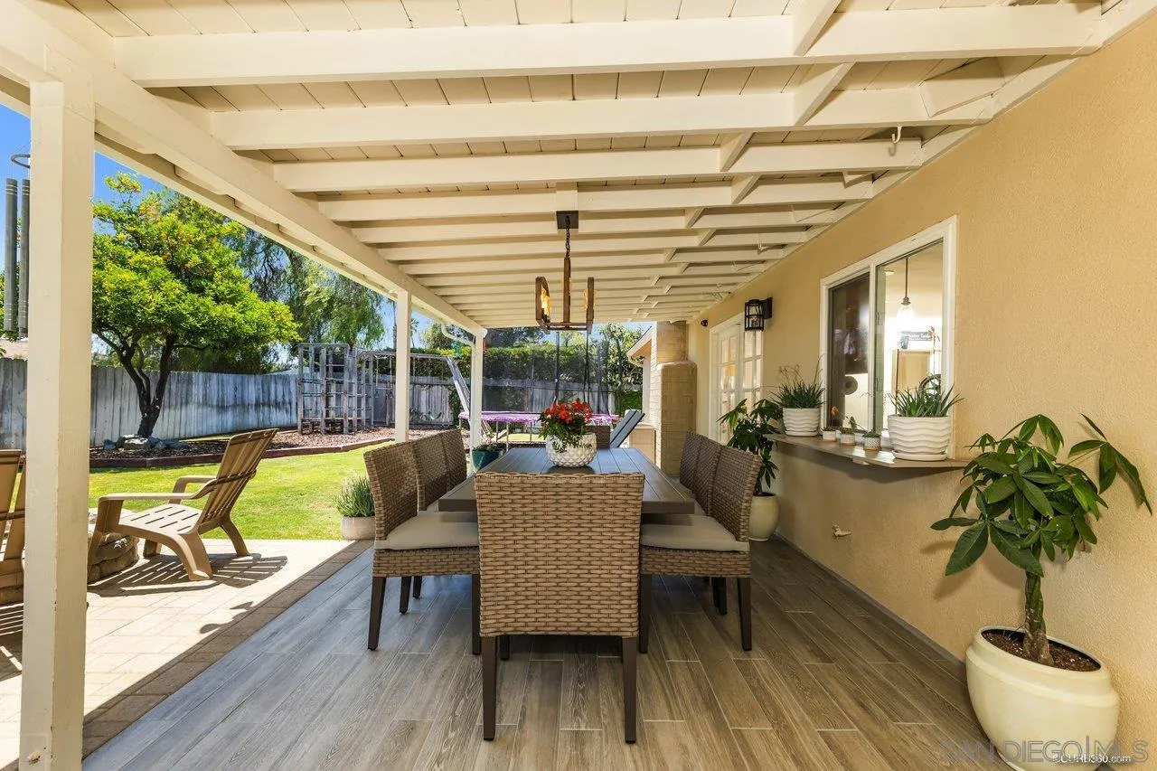 13317 Arikara Drive Poway, CA 92064 - Photo 30 of 52 a view of a dining room with furniture window and outside view