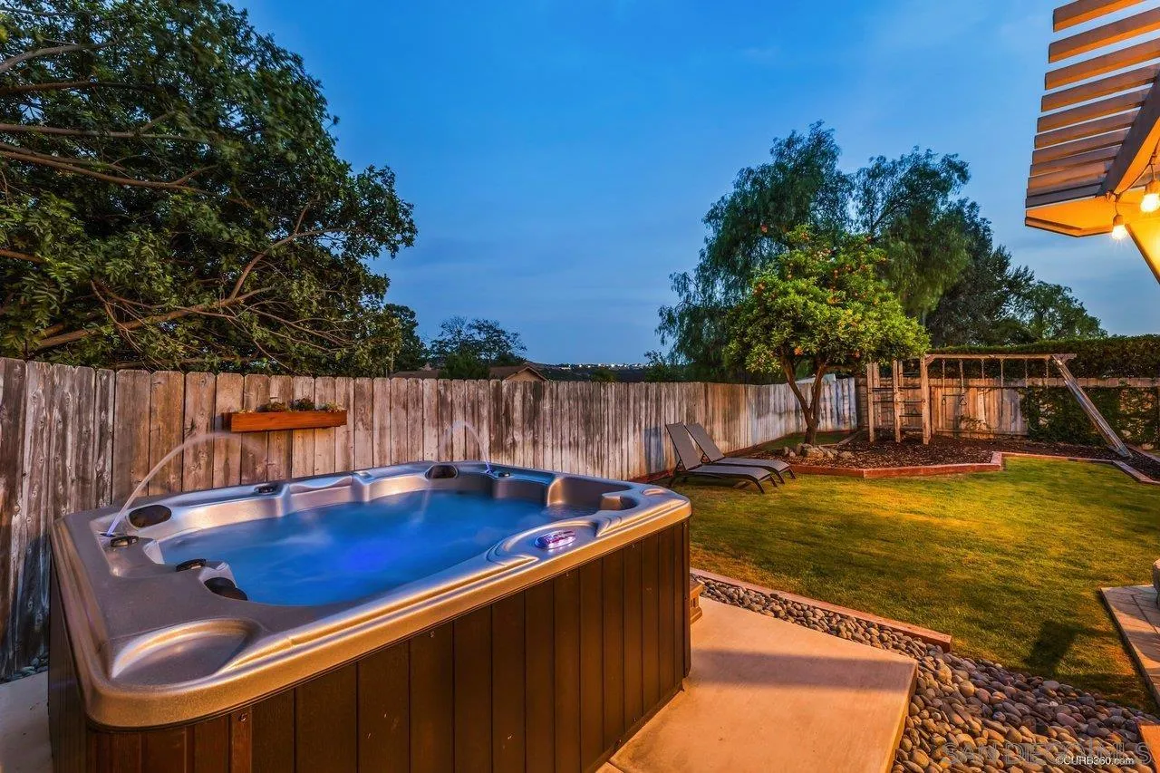 13317 Arikara Drive Poway, CA 92064 - Photo 49 of 52 a view of a swimming pool with an outdoor seating