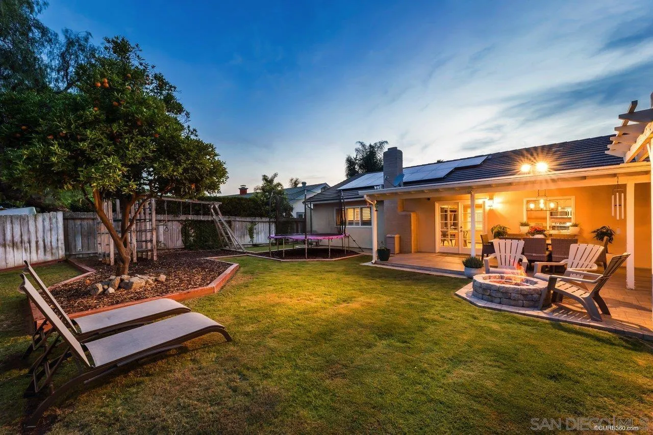 13317 Arikara Drive Poway, CA 92064 - Photo 50 of 52 a view of a swimming pool with a table and chairs