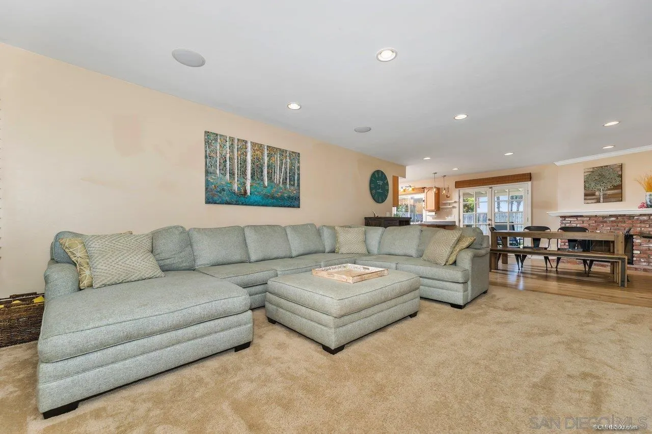 13317 Arikara Drive Poway, CA 92064 - Photo 8 of 52 a living room with furniture and kitchen view