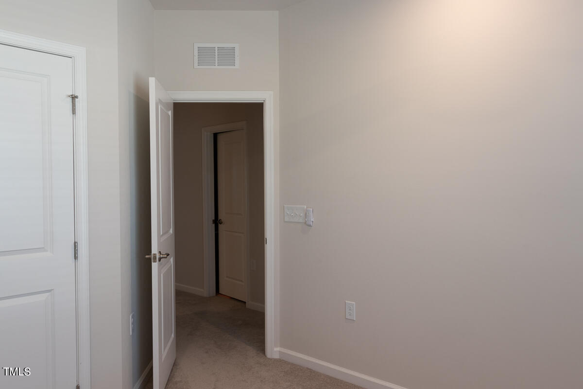 1505 Newpoint Drive Durham, NC 27713 - Photo 33 of 48 a view of a hallway with closet