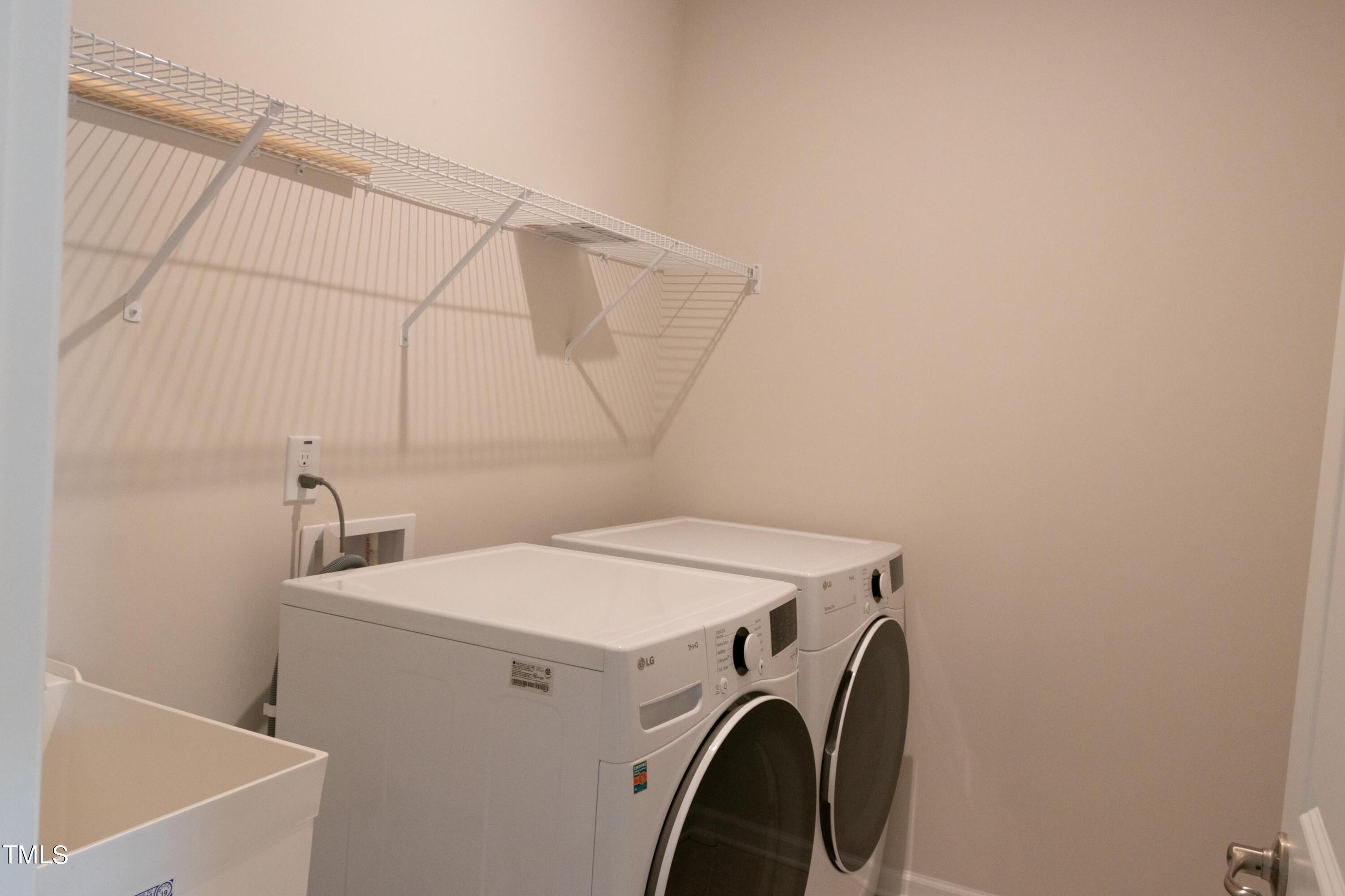1505 Newpoint Drive Durham, NC 27713 - Photo 37 of 48 a utility room with dryer and washer
