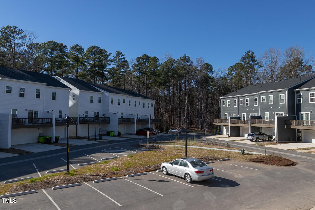 1505 Newpoint Drive Durham, NC 27713 - Photo 41 of 48 a swimming pool with yard and outdoor seating