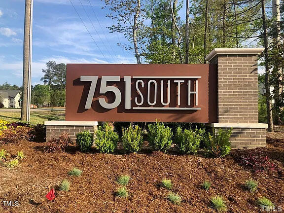 1505 Newpoint Drive Durham, NC 27713 - Photo 42 of 48 a sign broad in front of flowers