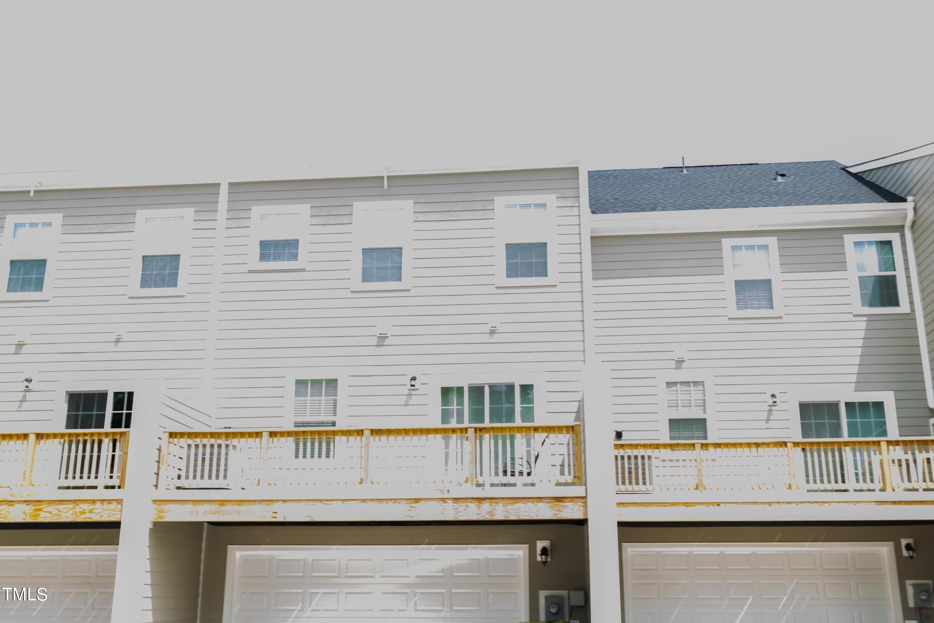 1505 Newpoint Drive Durham, NC 27713 - Photo 43 of 48 a view of building with balcony
