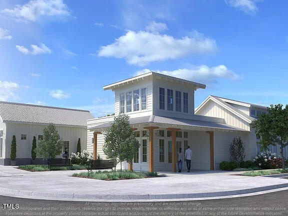 1505 Newpoint Drive Durham, NC 27713 - Photo 46 of 48 a view of a white house with a fountain in front of a house