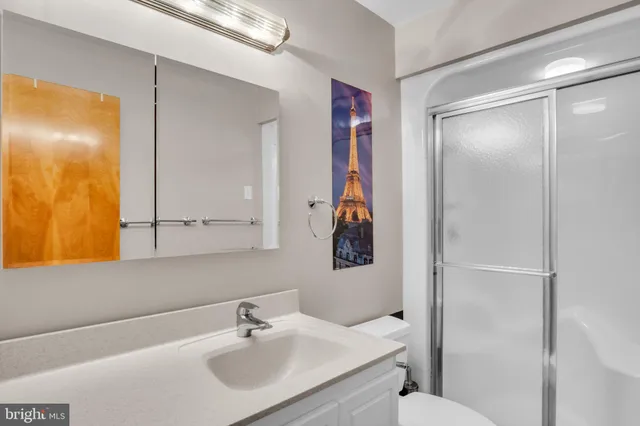 a view of room with window and ceiling fan