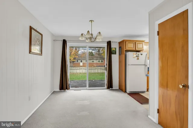 a view of livingroom with furniture and window