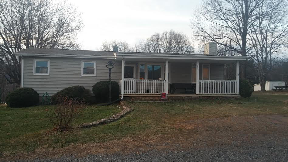327 Clemons Road Roanoke, VA 24019 - Photo 2 of 35 a backyard of a house with barbeque oven and outdoor seating