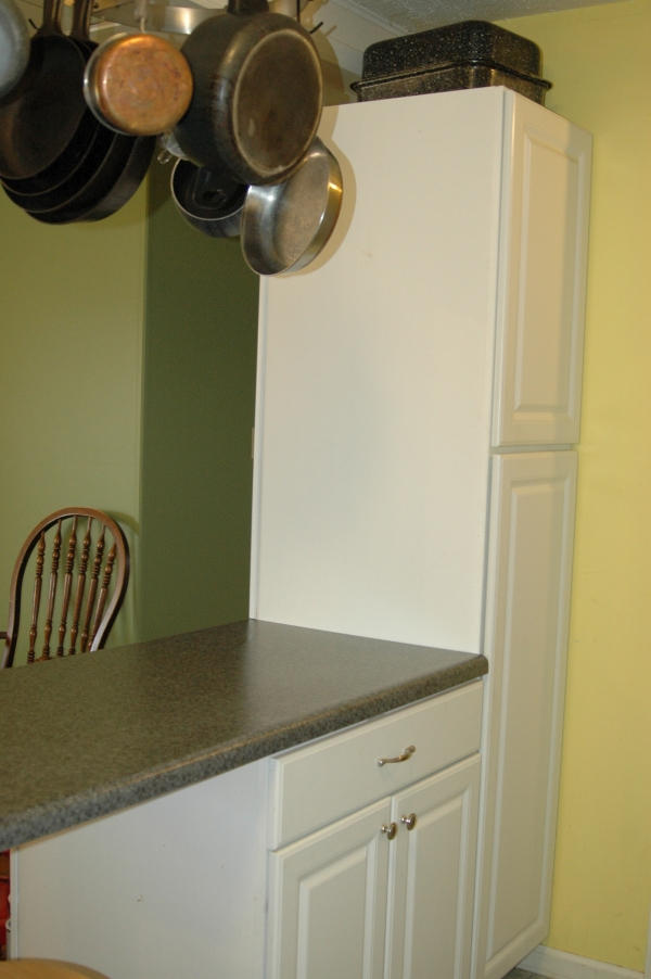 327 Clemons Road Roanoke, VA 24019 - Photo 15 of 35 a close view of shoes stand in the kitchen