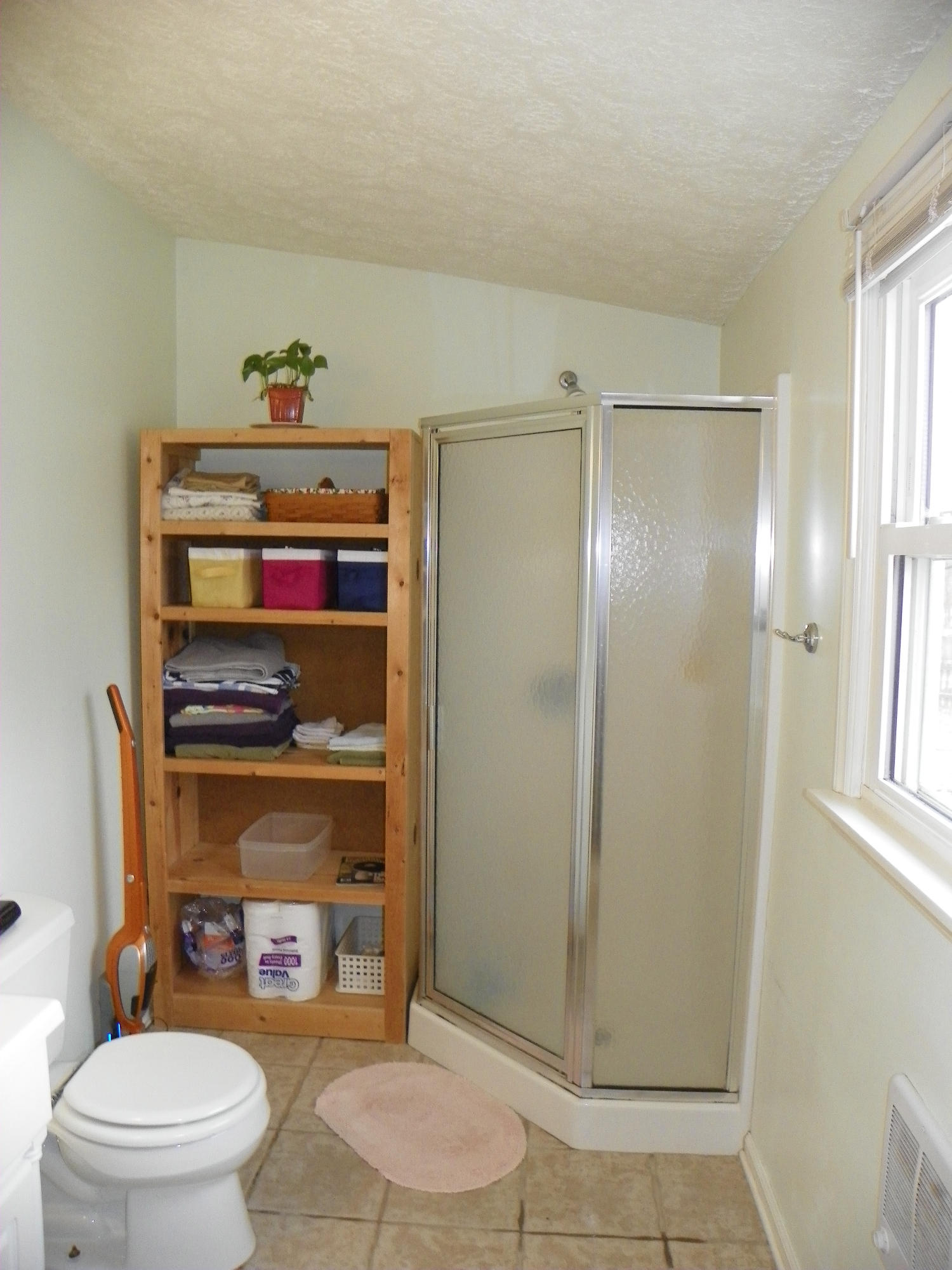 327 Clemons Road Roanoke, VA 24019 - Photo 24 of 35 a bathroom with a toilet and a shower