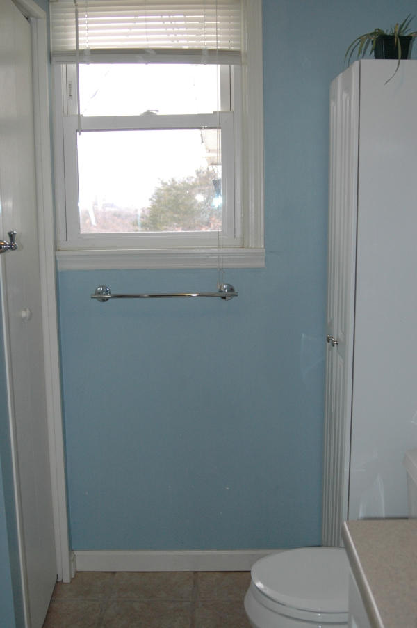 327 Clemons Road Roanoke, VA 24019 - Photo 29 of 35 a white toilet sitting next to a window in a bathroom