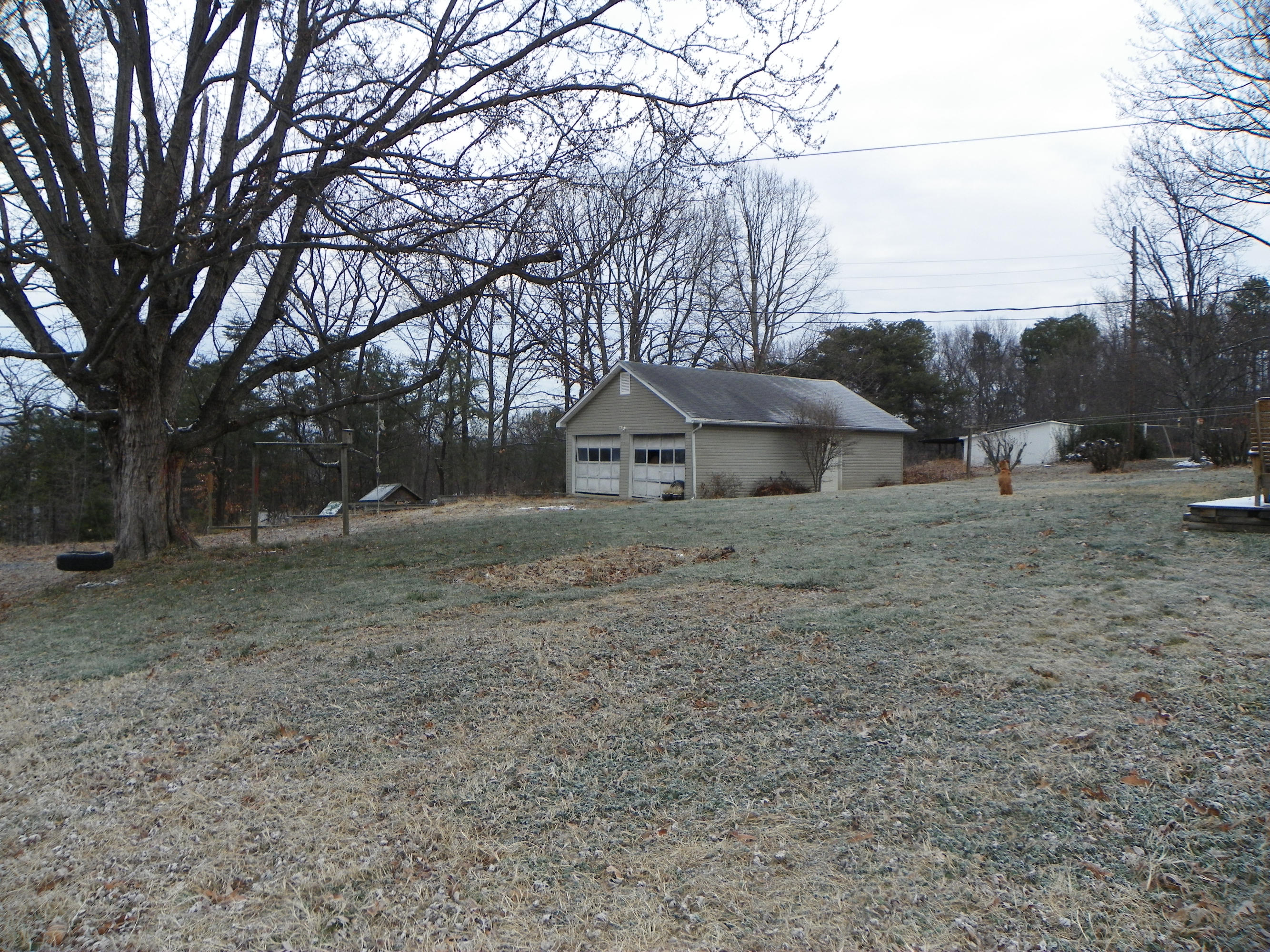 327 Clemons Road Roanoke, VA 24019 - Photo 6 of 35 a view of a house with a backyard
