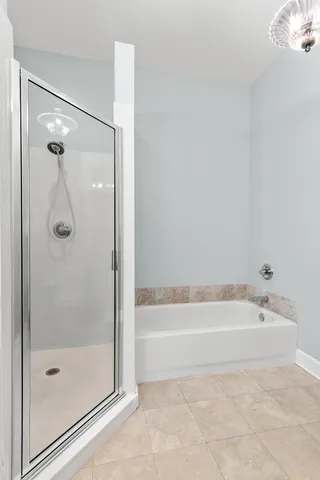 a view of a hallway with seating area