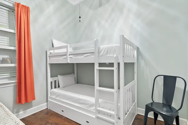 a room with furniture and a flat screen tv