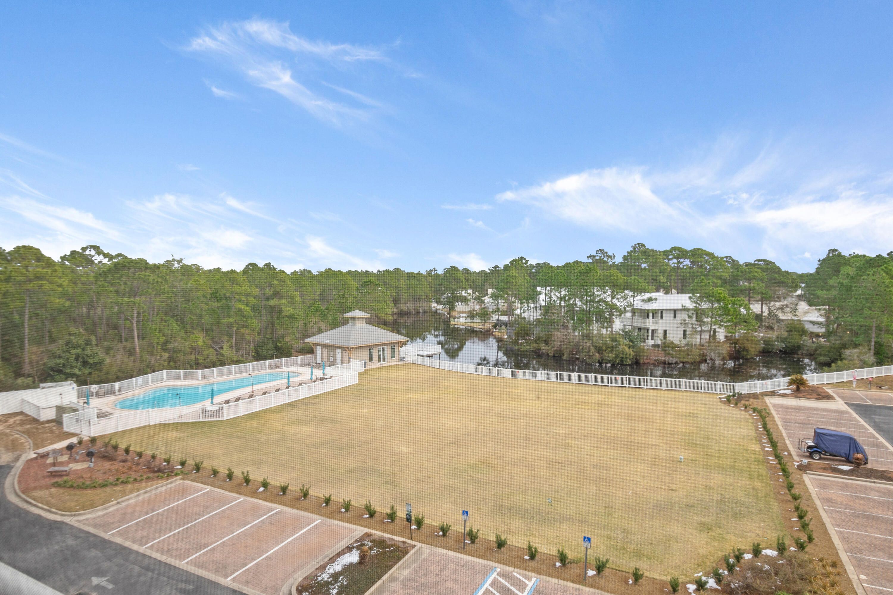231 Somerset Bridge Road, Unit 2408 Santa Rosa Beach, FL 32459 - Photo 26 of 27 a view of a swimming pool with an outdoor seating