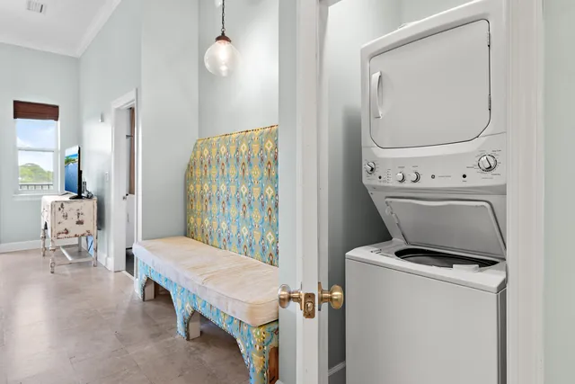 a kitchen with a table and chairs in it