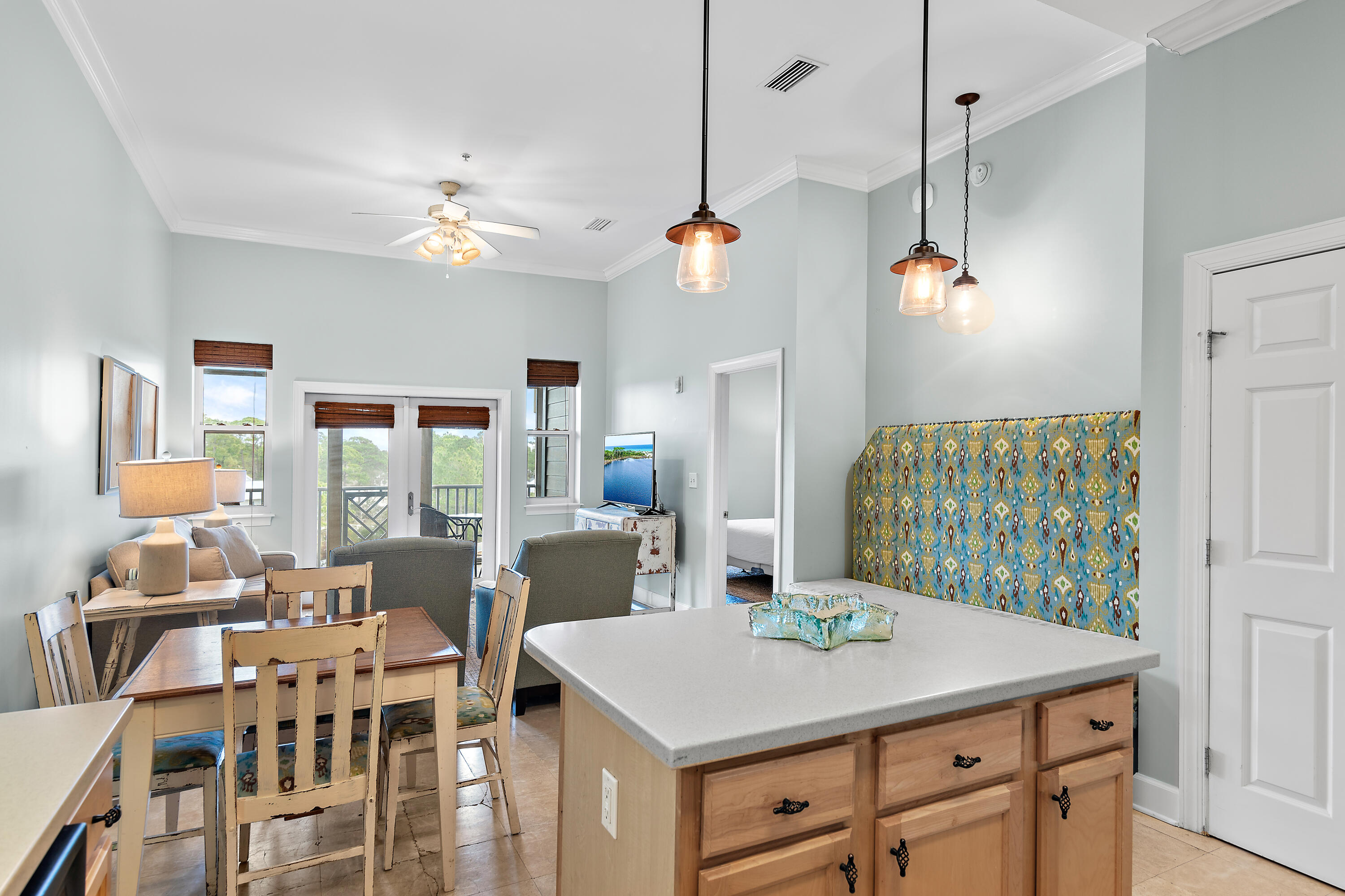 231 Somerset Bridge Road, Unit 2408 Santa Rosa Beach, FL 32459 - Photo 7 of 27 a view of a kitchen with a table and chairs