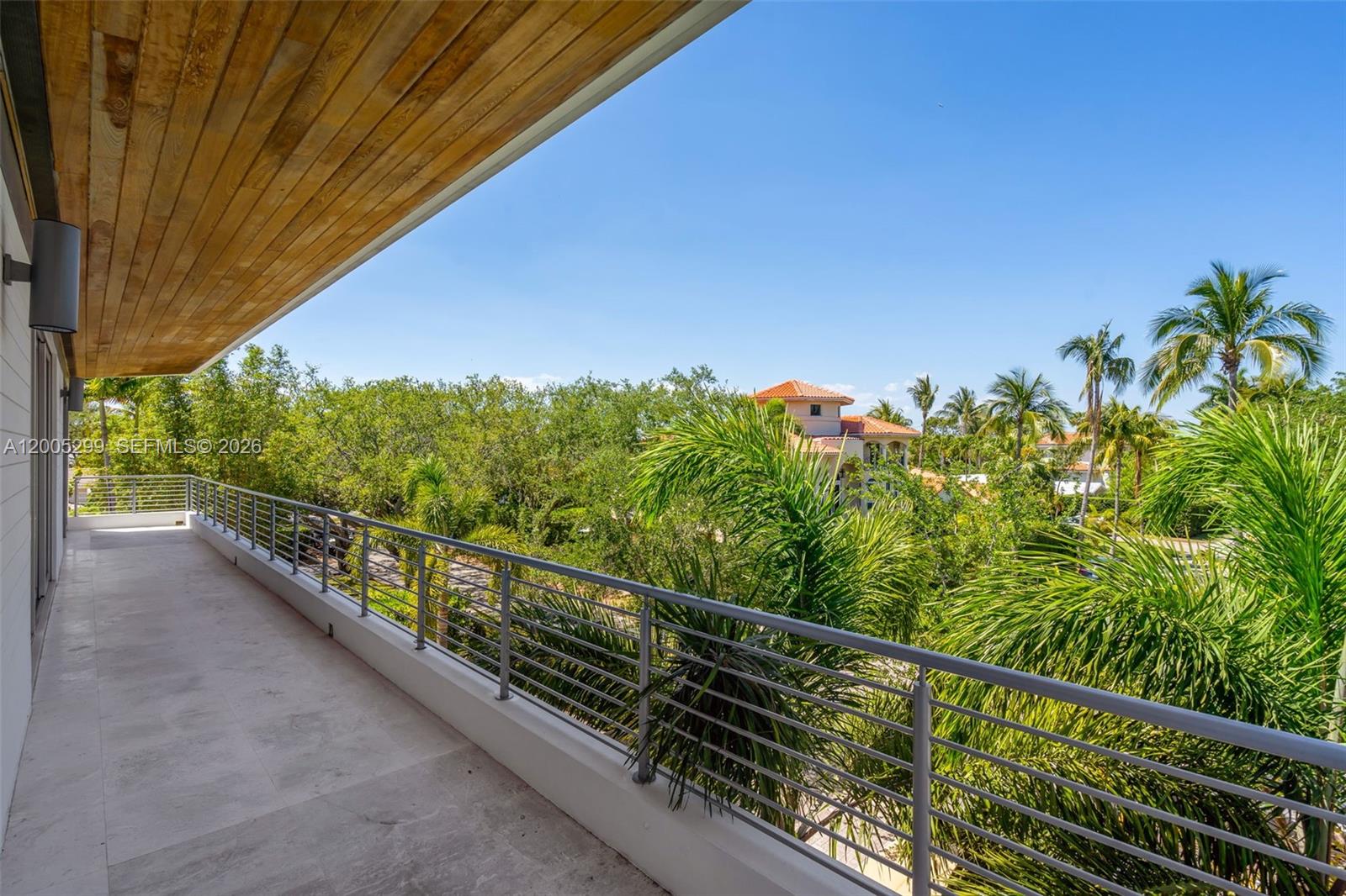 230 West McIntyre Street Key Biscayne, FL 33149 - Photo 27 of 53 a view of a balcony with an outdoor space