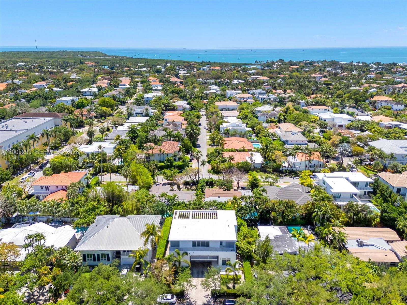 230 West McIntyre Street Key Biscayne, FL 33149 - Photo 49 of 53 an aerial view of residential houses with outdoor space and trees