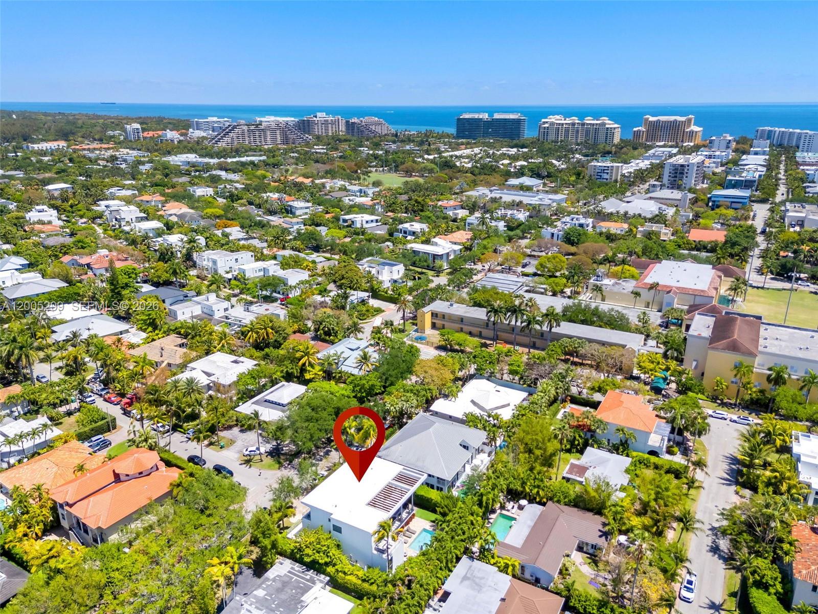 230 West McIntyre Street Key Biscayne, FL 33149 - Photo 51 of 53 an aerial view of residential houses with outdoor space and trees