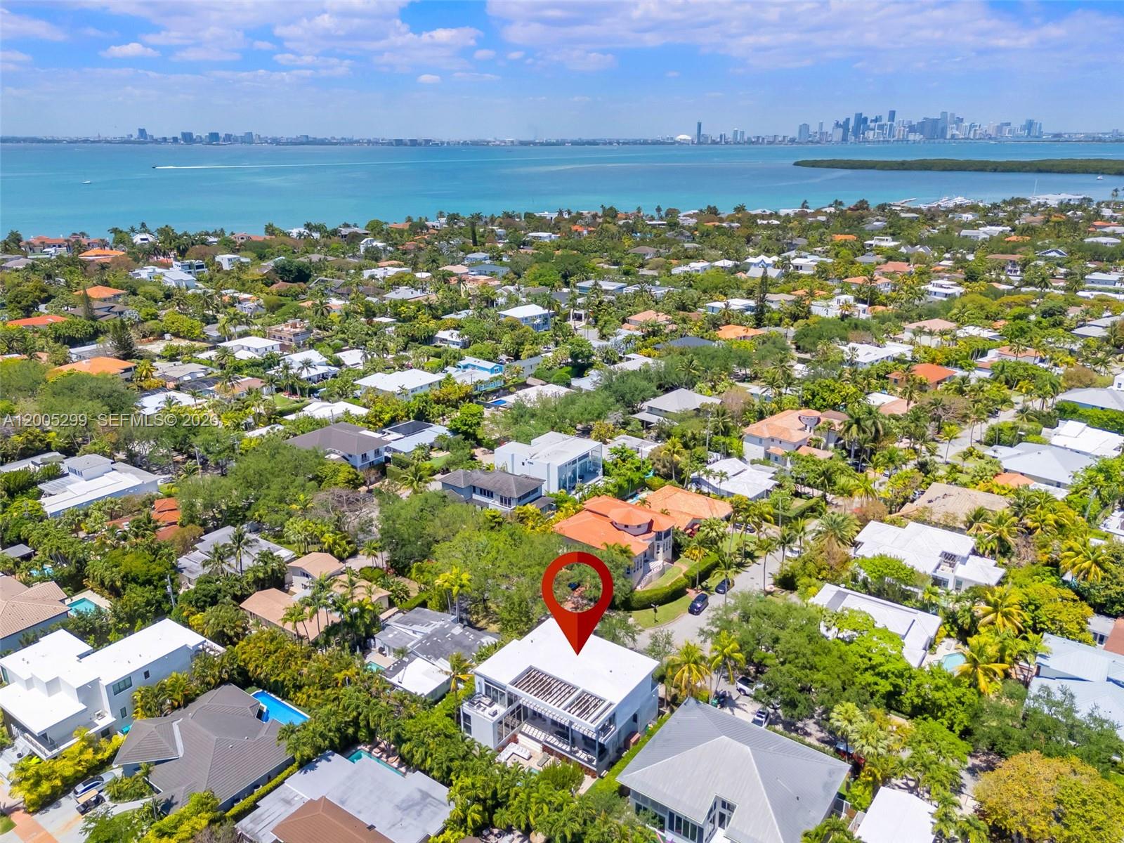 230 West McIntyre Street Key Biscayne, FL 33149 - Photo 52 of 53 an aerial view of a house with a lake