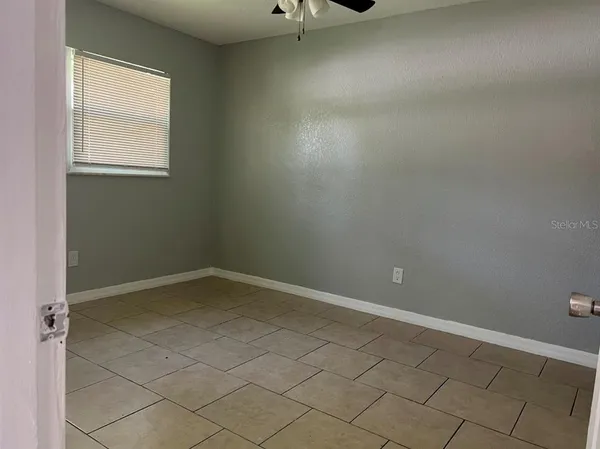 an empty room with a window