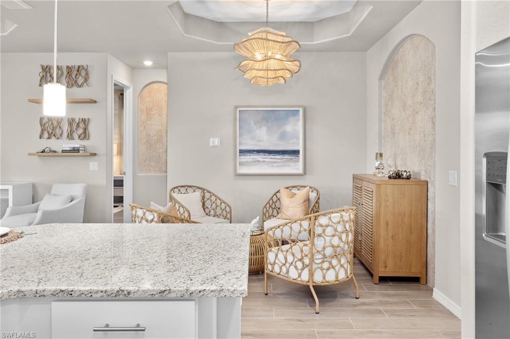 15048 Redbud Lane Punta Gorda, FL 33955 - Photo 14 of 34 a view of living room with furniture and chandelier