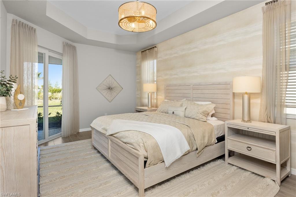 15048 Redbud Lane Punta Gorda, FL 33955 - Photo 18 of 34 a bedroom with a bed and a window