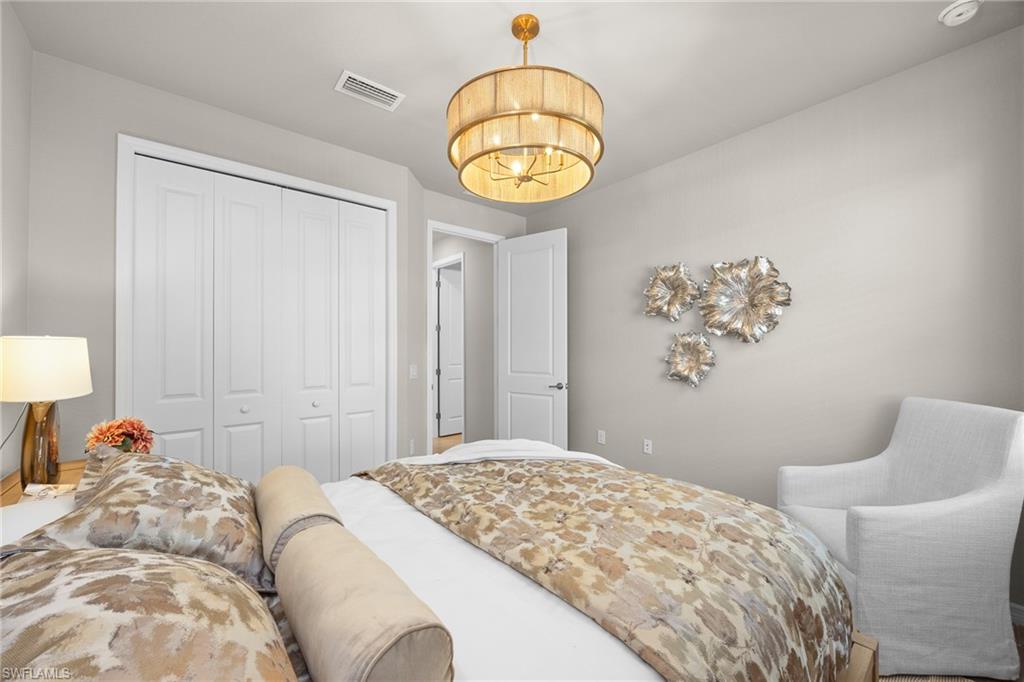 15048 Redbud Lane Punta Gorda, FL 33955 - Photo 22 of 34 a bedroom with bed and a window