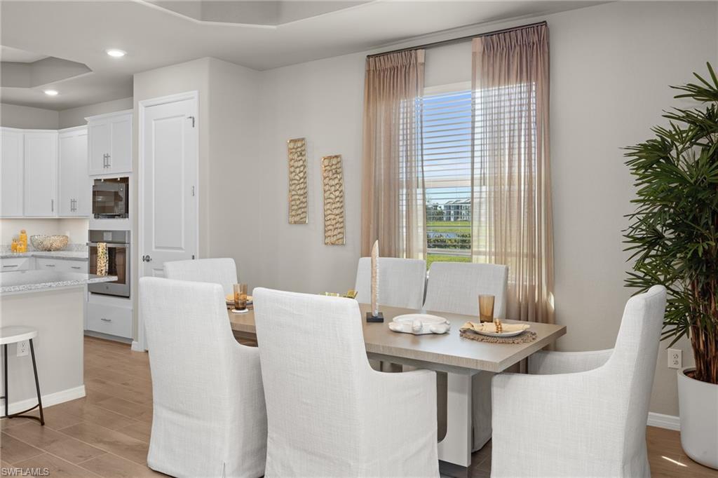15048 Redbud Lane Punta Gorda, FL 33955 - Photo 9 of 34 a view of a dining room with furniture and window
