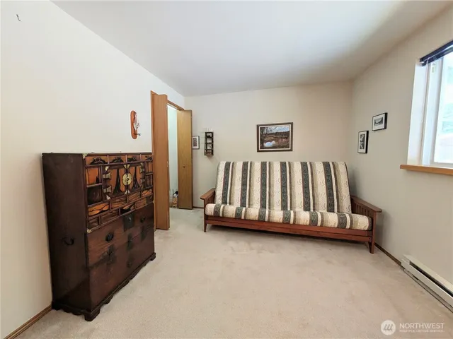 a view of a workspace with furniture